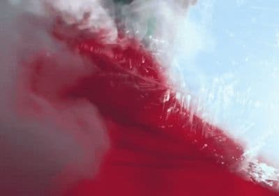 a blurry image of a red and white object