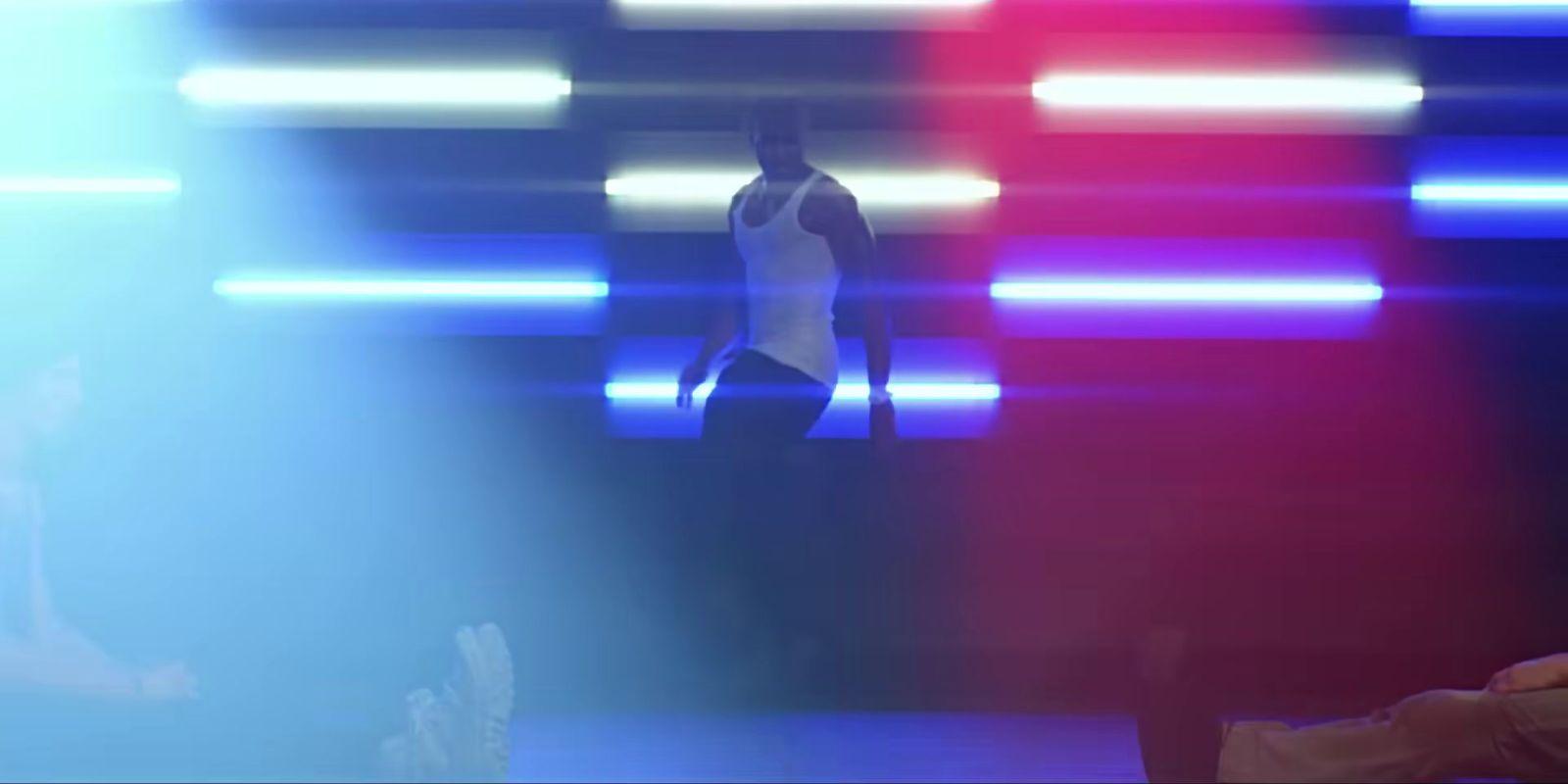 a blurry image of a person standing on a stage