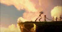 a man standing on top of a cliff