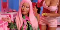 a woman with pink hair and a pink wig