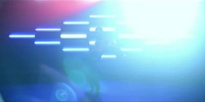 a blurry image of a person standing on a stage
