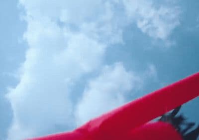 a blurry photo of a red object in the sky