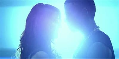 a man and a woman standing next to each other