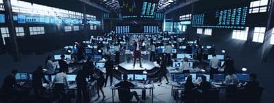 a large room filled with lots of computer monitors