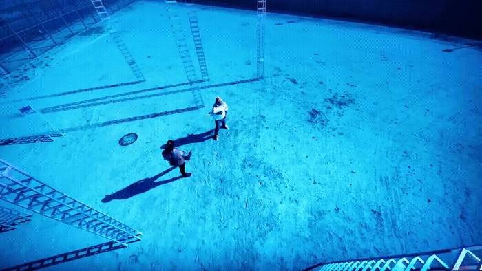 a man and a woman playing a game of frisbee