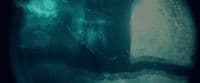 a close up of a person's feet in the water