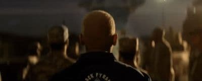 a man standing in front of a crowd of people