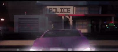 a blurry picture of a police car in front of a building