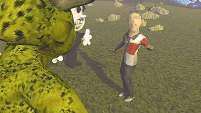 a young boy standing in front of a giant creature