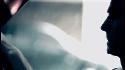 a close up of a person sitting in a car