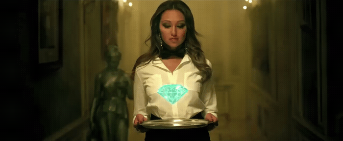 a woman holding a plate in a hallway