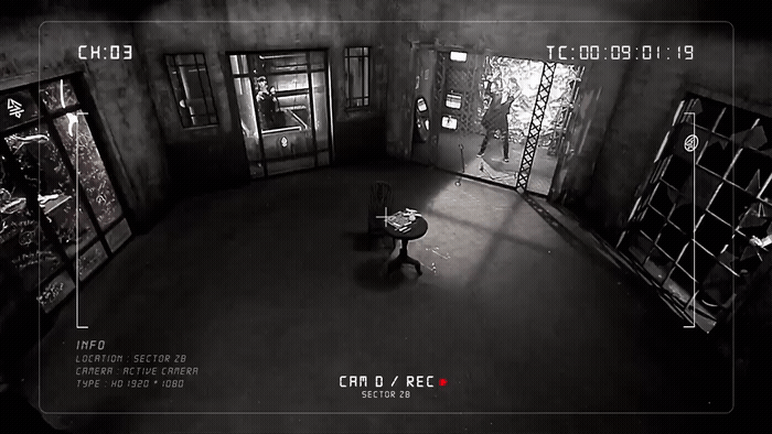 a black and white photo of a room with a bench