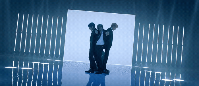 a couple of men standing next to each other