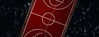 an overhead view of a basketball court at night