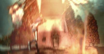 a blurry image of a building with a clock tower