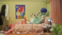 a child's room with a bed and toys