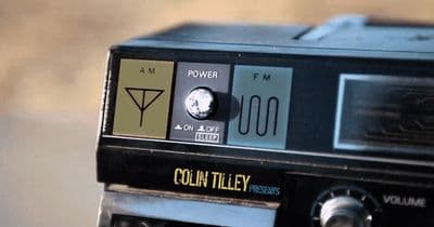 a close up of an old fashioned radio
