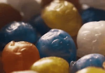 a close up of a bunch of colorful candies