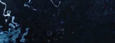a close up of a window with water on it