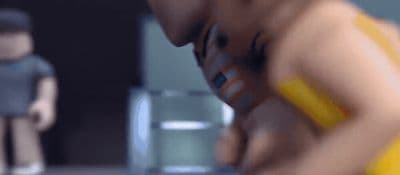 a blurry image of a man in a yellow bathing suit