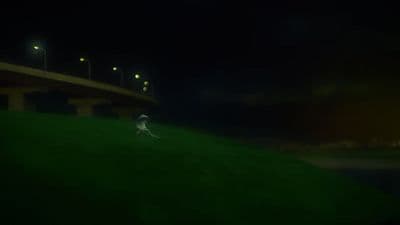 a blurry image of a person running on a hill at night