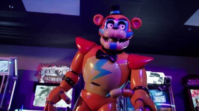 a cartoon character standing in front of some slot machines
