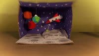 a paper model of a space station on a table