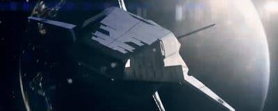 a space station with a satellite in the background