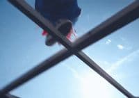 a skateboarder is doing a trick in the air
