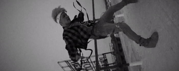 a man jumping up in the air with a skateboard