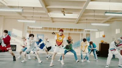 a group of people dancing in a room