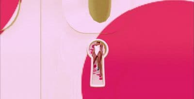 a pair of scissors hanging from a hook
