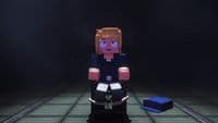 a woman standing in a dark room with a blue object