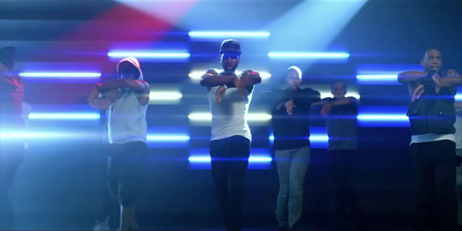 a group of people standing on top of a stage