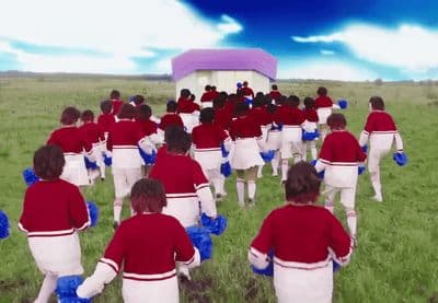 a group of people in red and white uniforms
