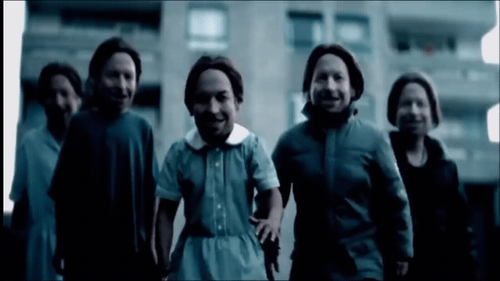 a group of people standing next to each other