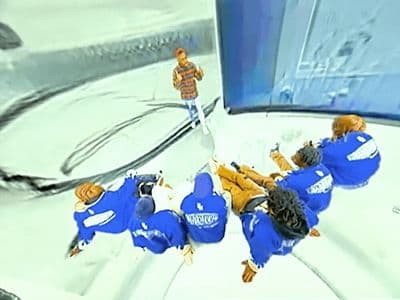 a group of people riding on top of a snow covered ski slope