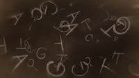 a black and white photo of letters written in chalk