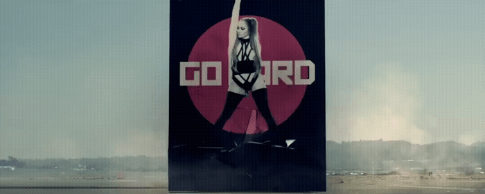 a large billboard with a woman holding a flag