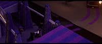 an aerial view of a purple and black building
