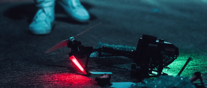 a person standing next to a toy airplane on the ground