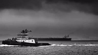 a large boat traveling across a large body of water