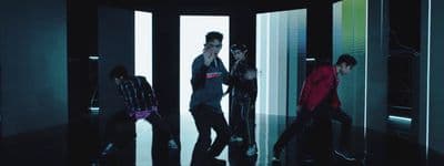 a group of people standing in a room