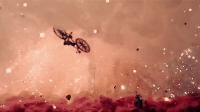 a bike is flying through the air in the sky