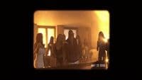 a group of people standing in a room