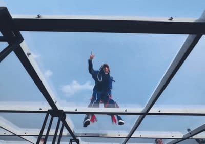 a person jumping in the air on a skateboard