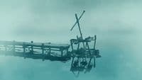 a boat sitting on top of a body of water