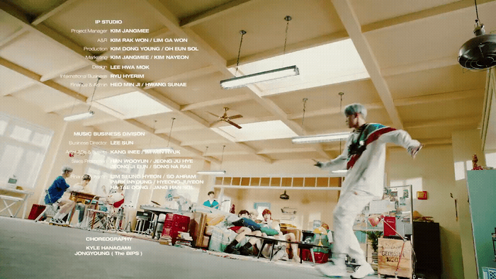 a man standing on top of a floor in a room