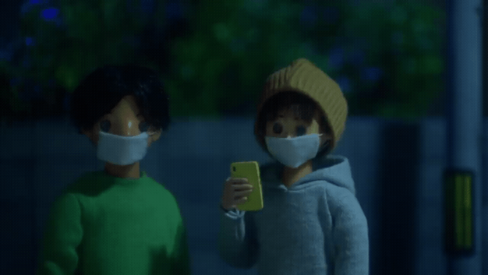a couple of people standing next to each other wearing face masks
