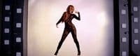 a picture of a woman in a body suit